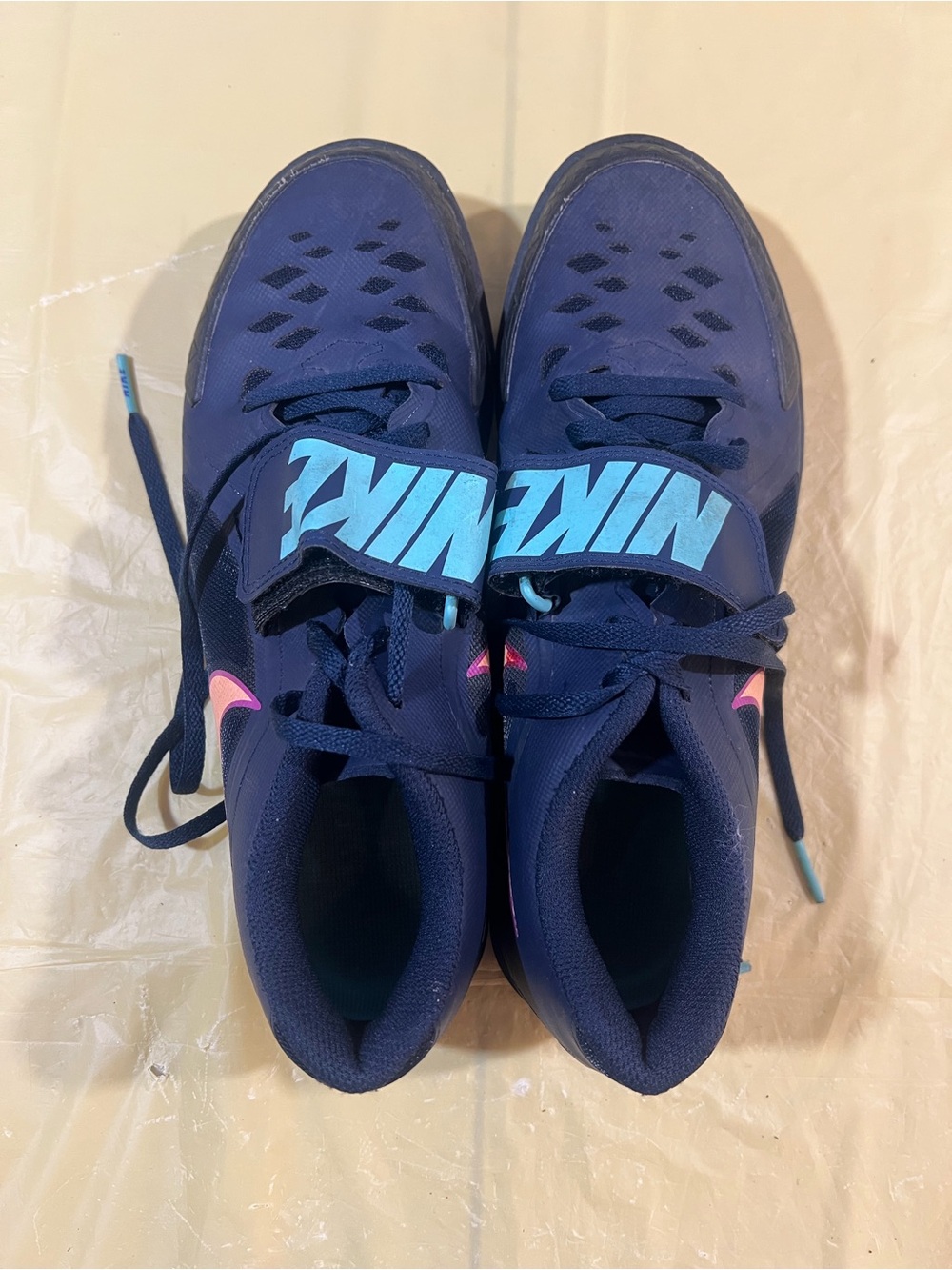 Nike Navy Sneakers with Light Blue Logo and Pink Accents